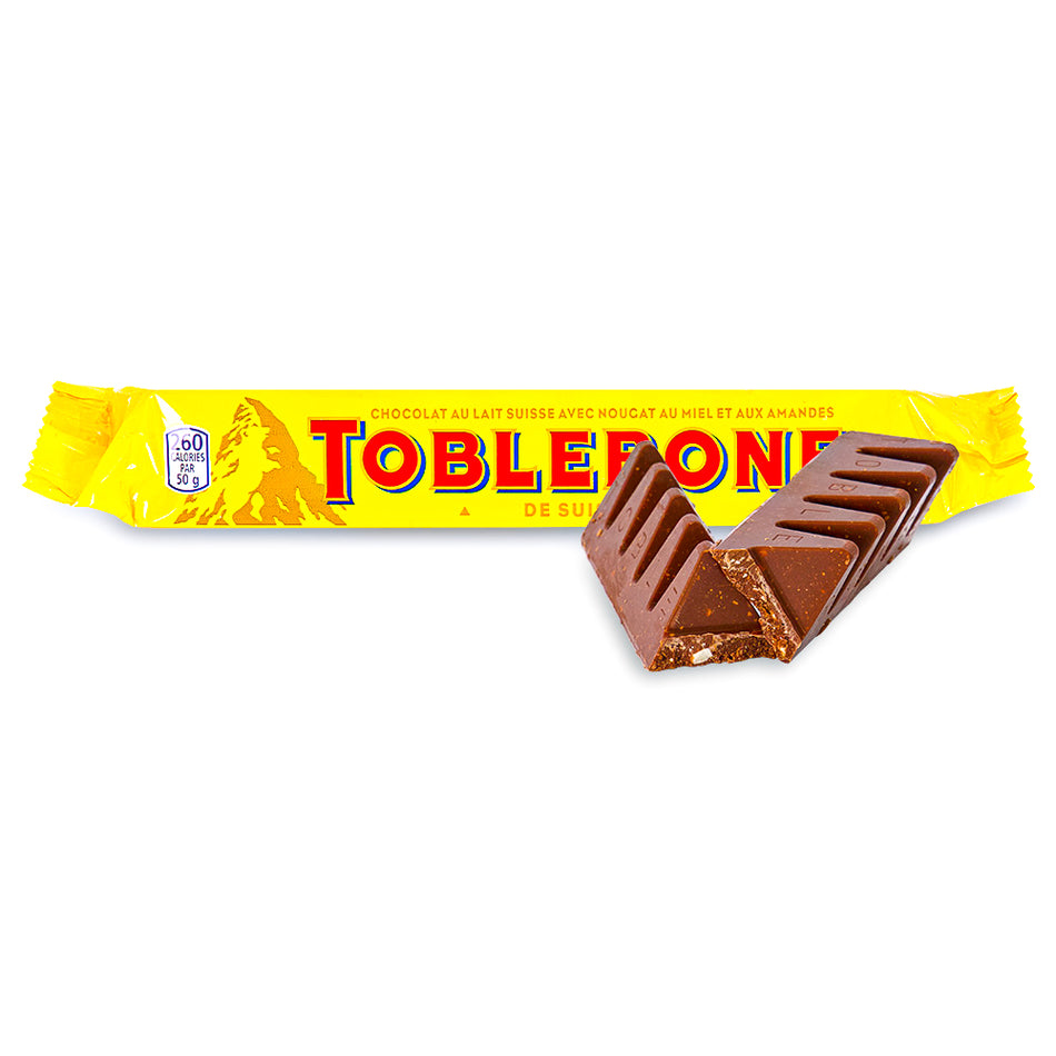 Toblerone Milk Chocolate - 50 g, Toblerone Milk Chocolate, Swiss chocolate delight, Creamy alpine adventure, Fine Swiss milk chocolate, Iconic triangular treat, Honey and almond nougat, Chocolate symphony, Toblerone bliss, Swiss chocolate masterpiece, Alpine chocolate magic, toblerone, toblerone chocolate, toblerone chocolate bar, swiss chocolate